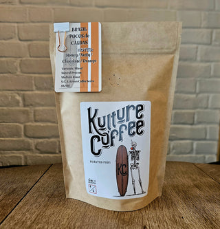 A bag of coffee beans containing Brazil: Pocos de Caldas